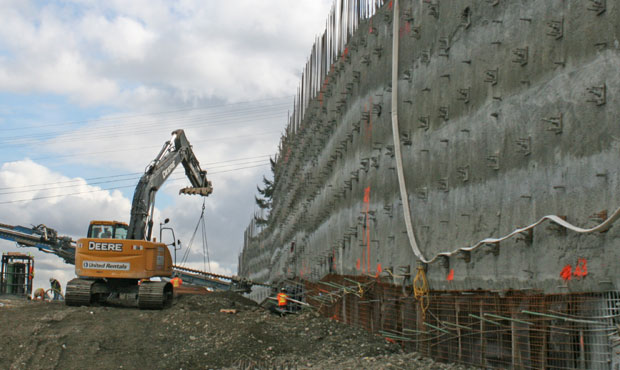 Construction work on a roadway or bridge in Tacoma, Washington, by WSDOT, indicating infrastructure projects.